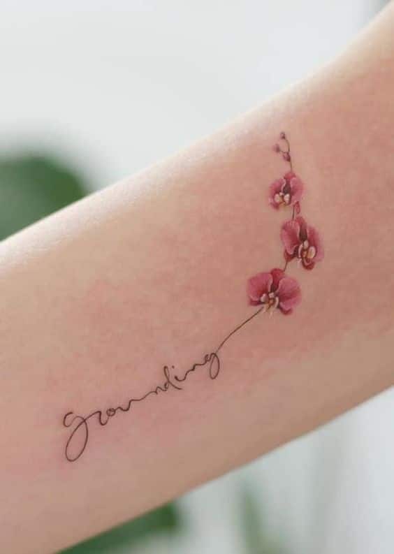 tatuaje orquidea palabra