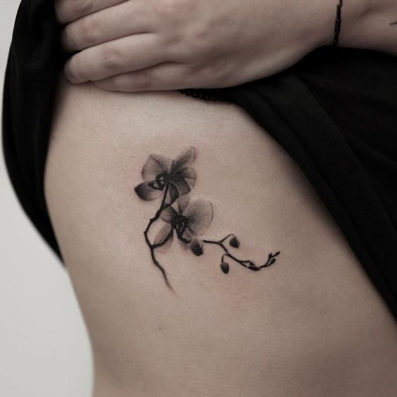 tatuaje orquidea negro