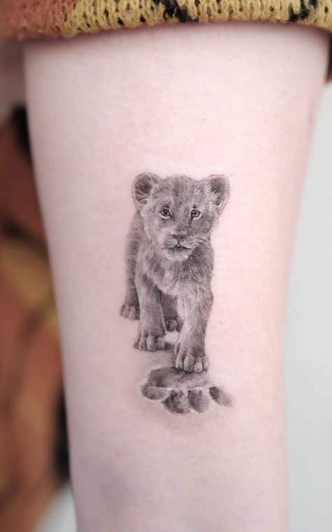tatuaje león cachorro