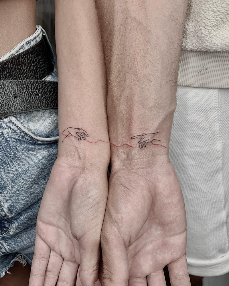 tatuajes parejas hilo rojo