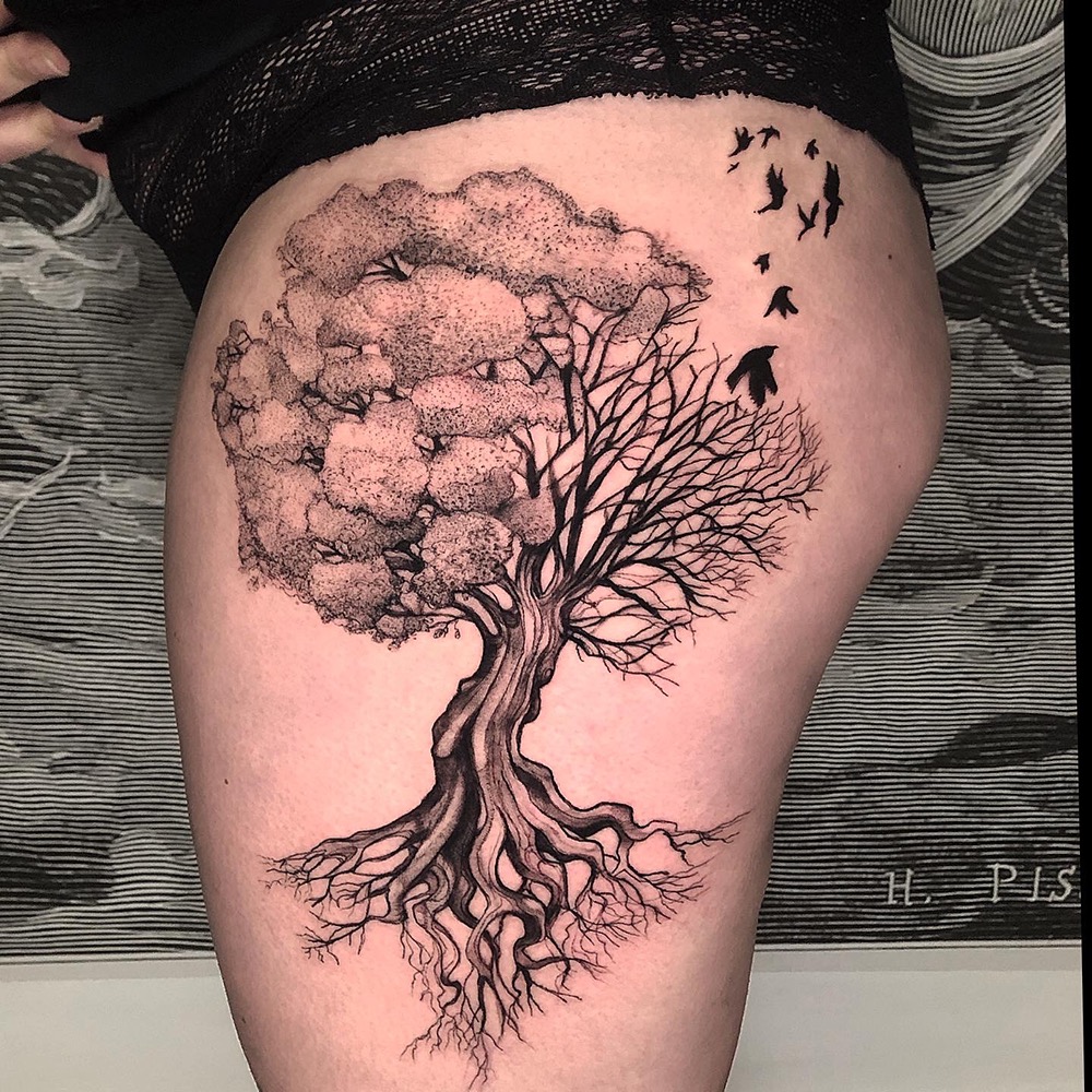 tatuaje árbol de la vida muslo