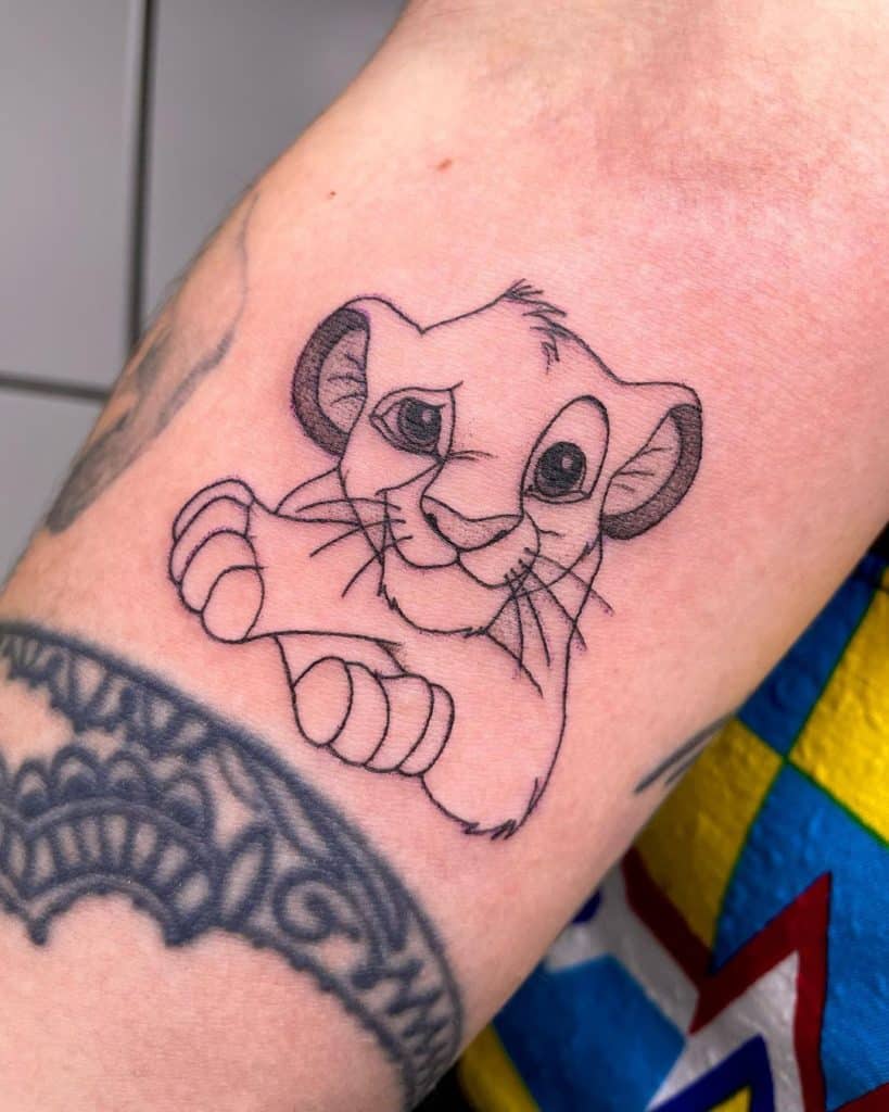 tatuaje león simba