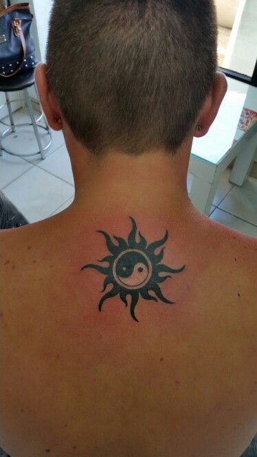 tatuaje sol y luna ying yang