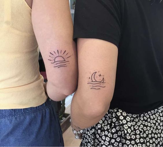 tatuaje sol y luna codo