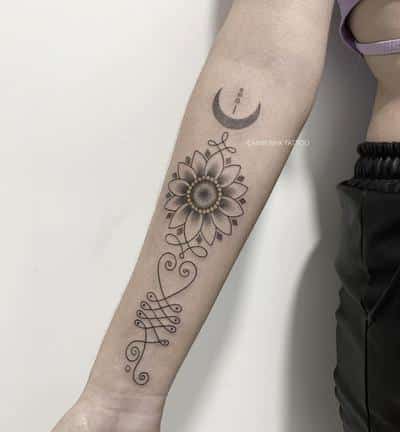 tatuaje sol y luna antebrazo