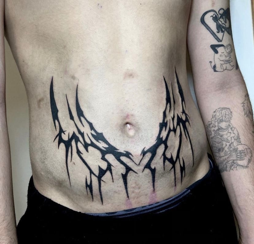tatuajes abdomen bajo