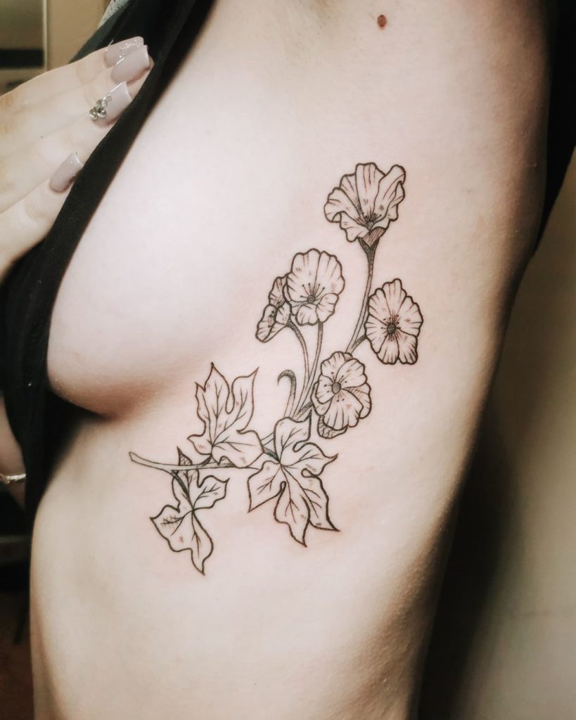 tatuajes costilla flor