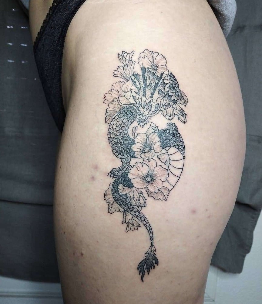 tatuajes dragones muslo