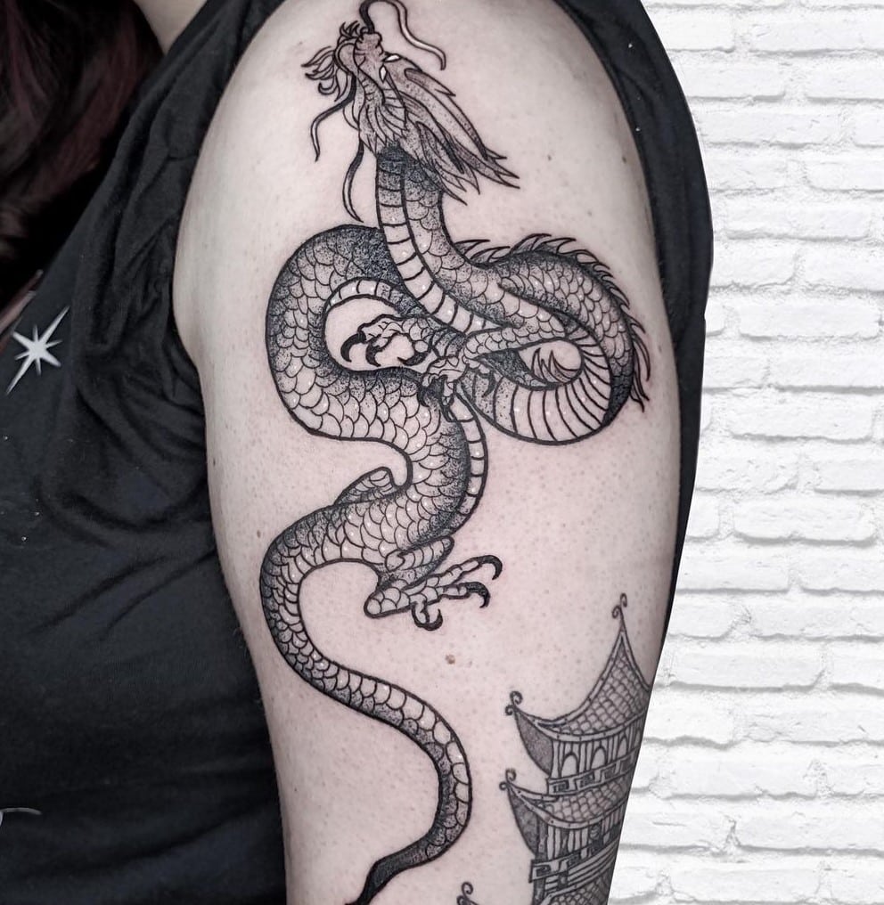tatuajes dragones brazo
