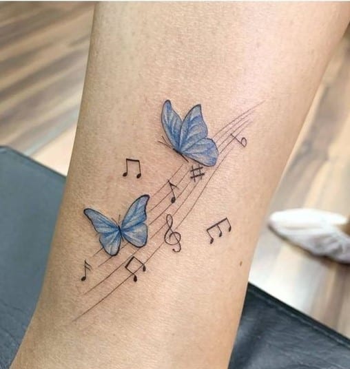 tatuajes musicales mariposas
