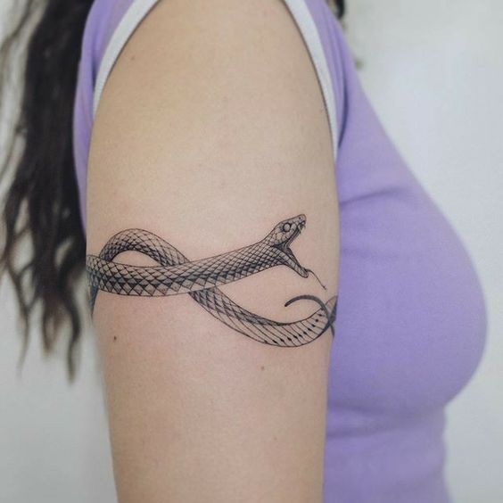 tatuaje serpiente brazalete