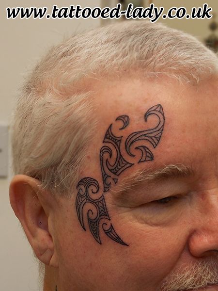 tatuajes maoríes cara