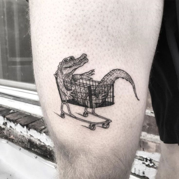 tatuaje cocodrilo hombre