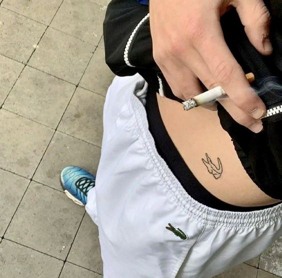 tatuaje cocodrilo lacoste