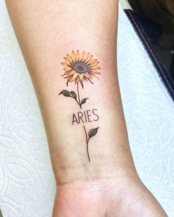 tatuaje aries lettering
