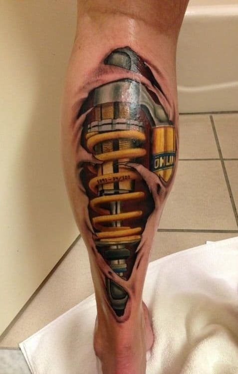 tatuajes biomecánicos pierna